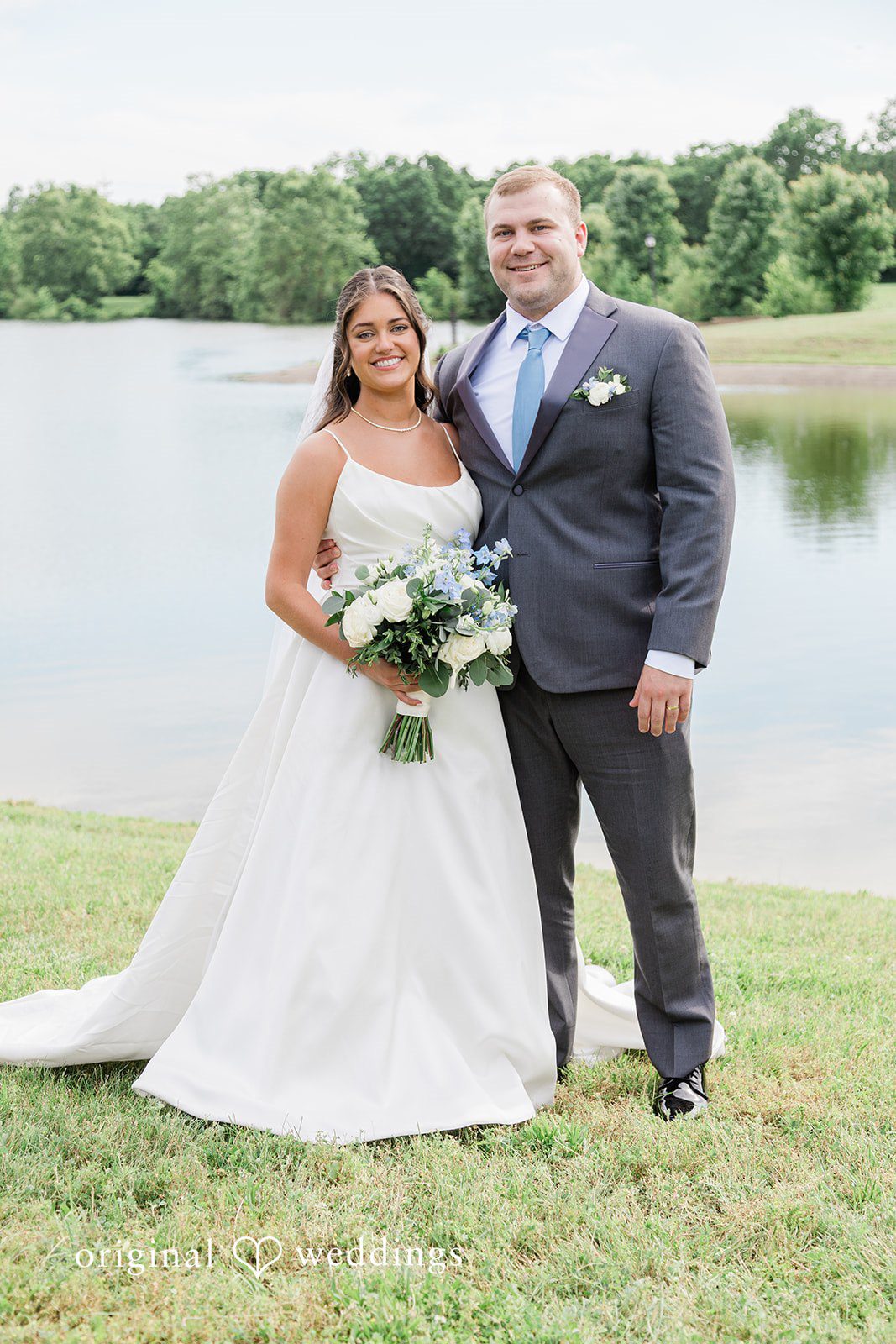 A portrait of the couple by the lake