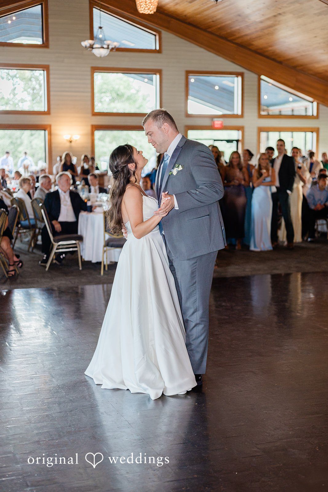 The couple takes their first dance