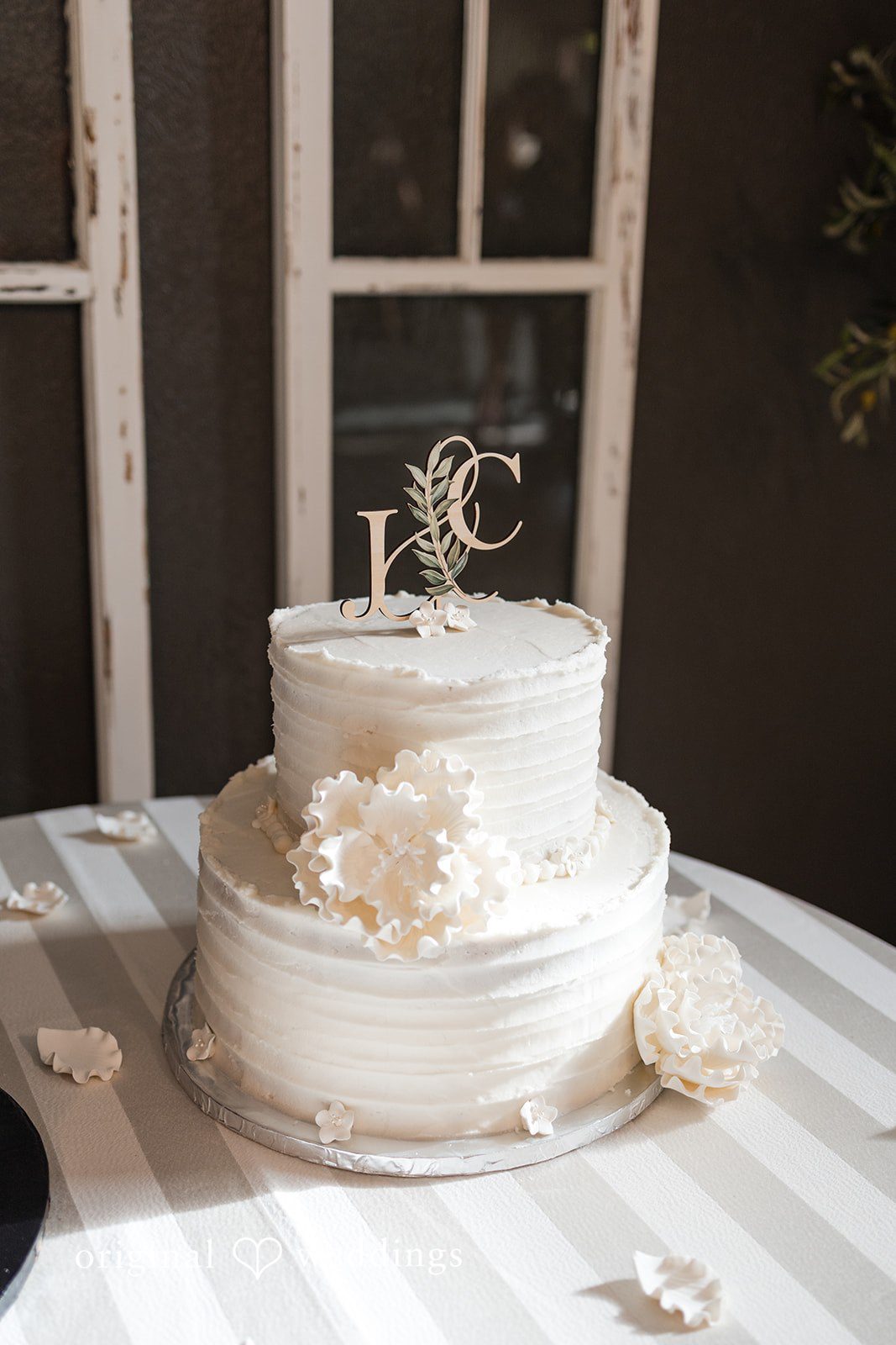 Elegant wedding cake display at the reception