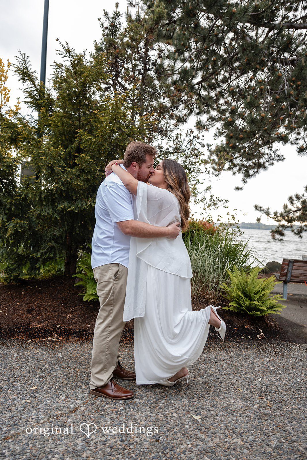 The couple shares a deep kiss