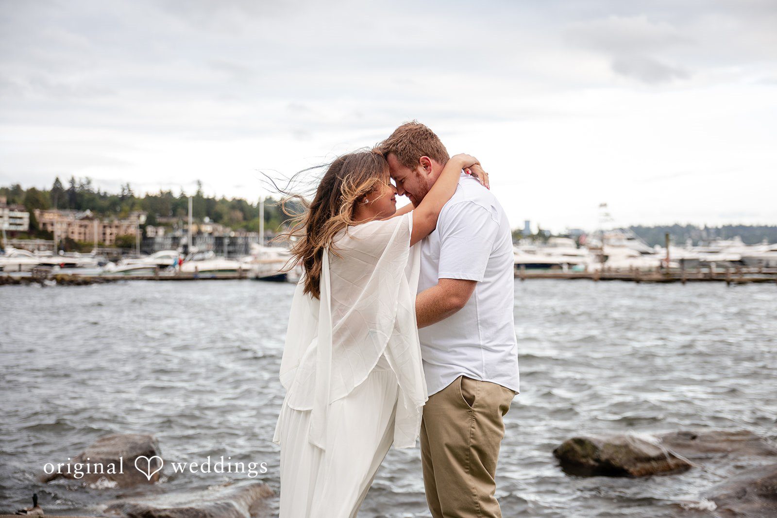 Our Seattle engagement photographers captured the moment the couple shared a romantic moment by the waterfront