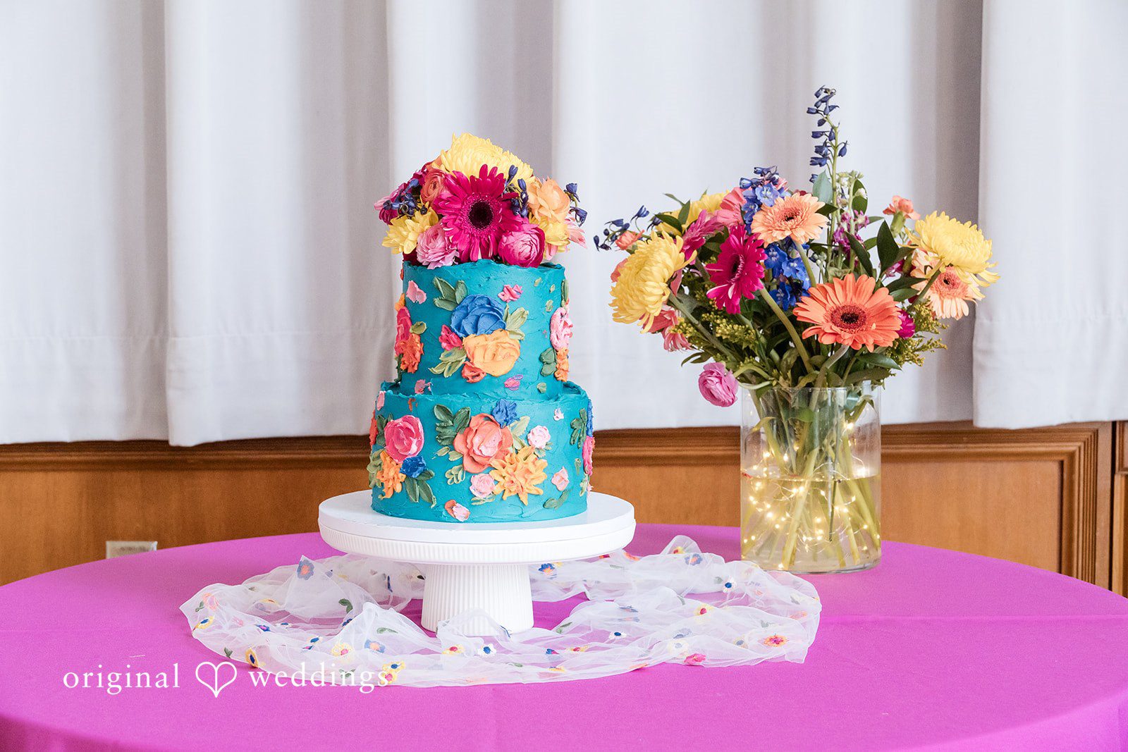 Wedding cake adorned with florals