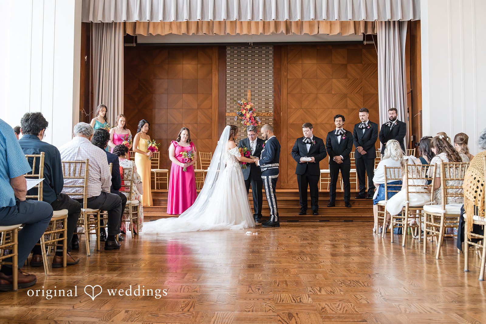 The bride and groom exchange marital vows