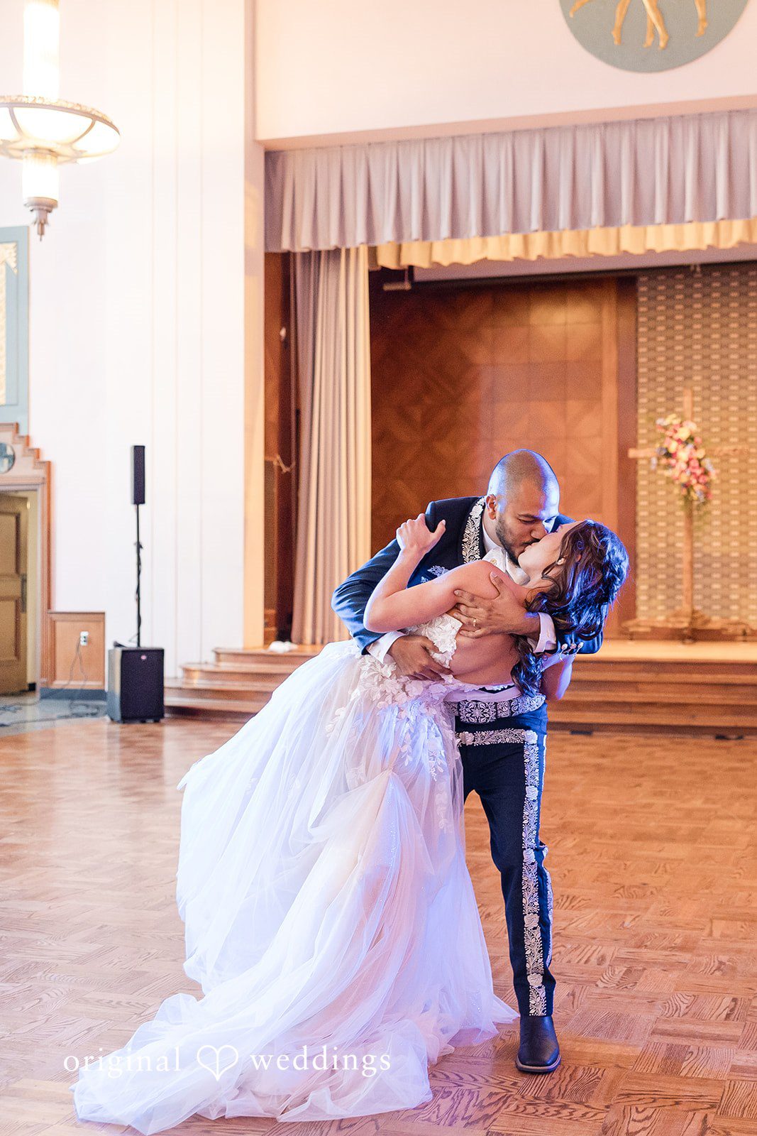 The couple shares a romantic moment at the wedding reception