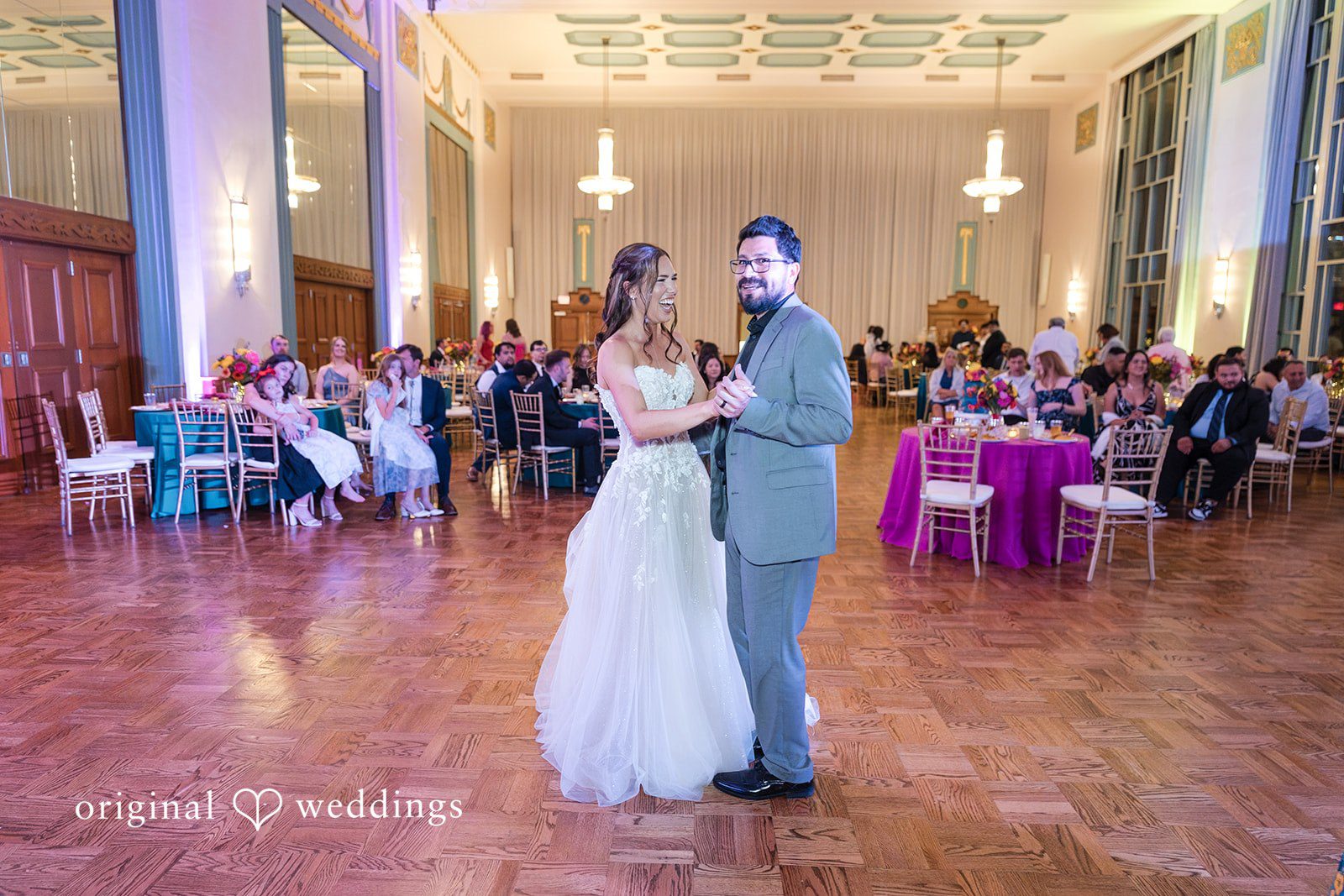 The bride dances with family