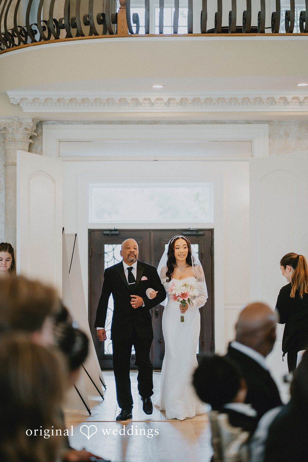 Destiny + Daniel The bride's father escorts the bride down the aisle