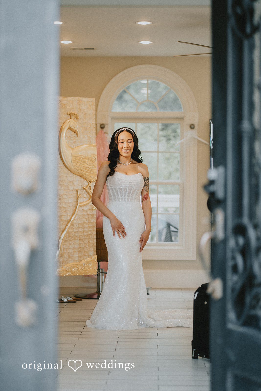 Destiny + Daniel Our DC wedding photographers captured a stunning portrait of the bride at the suite