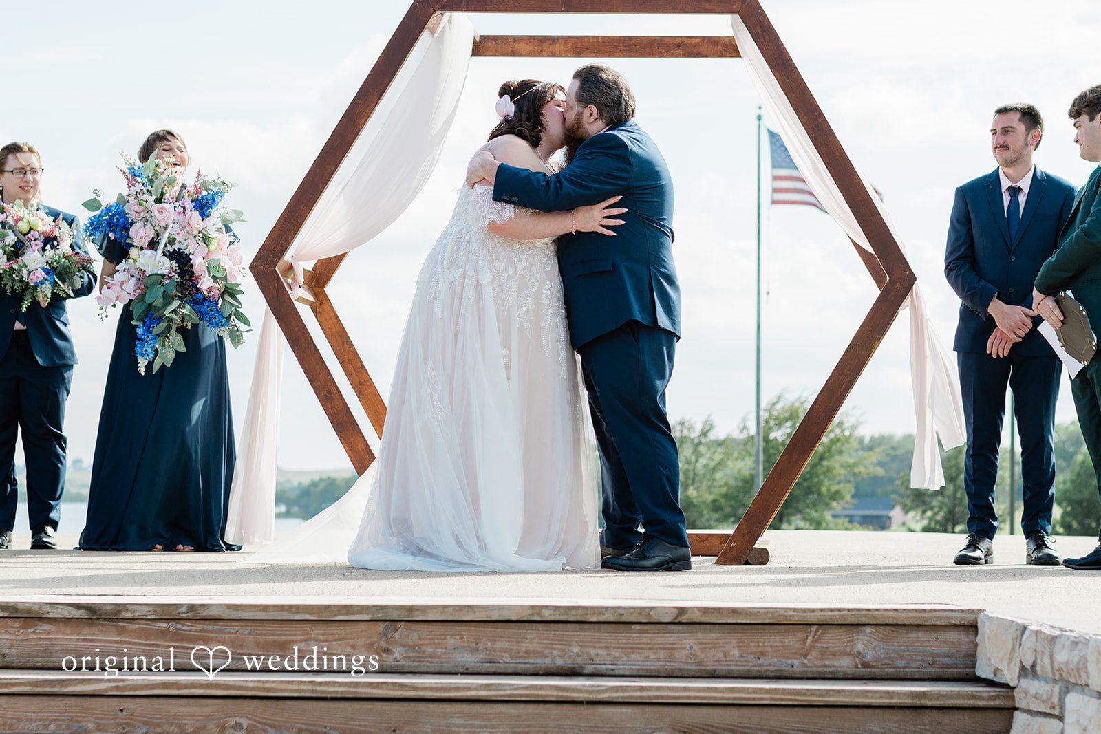 The couple takes their first kiss
