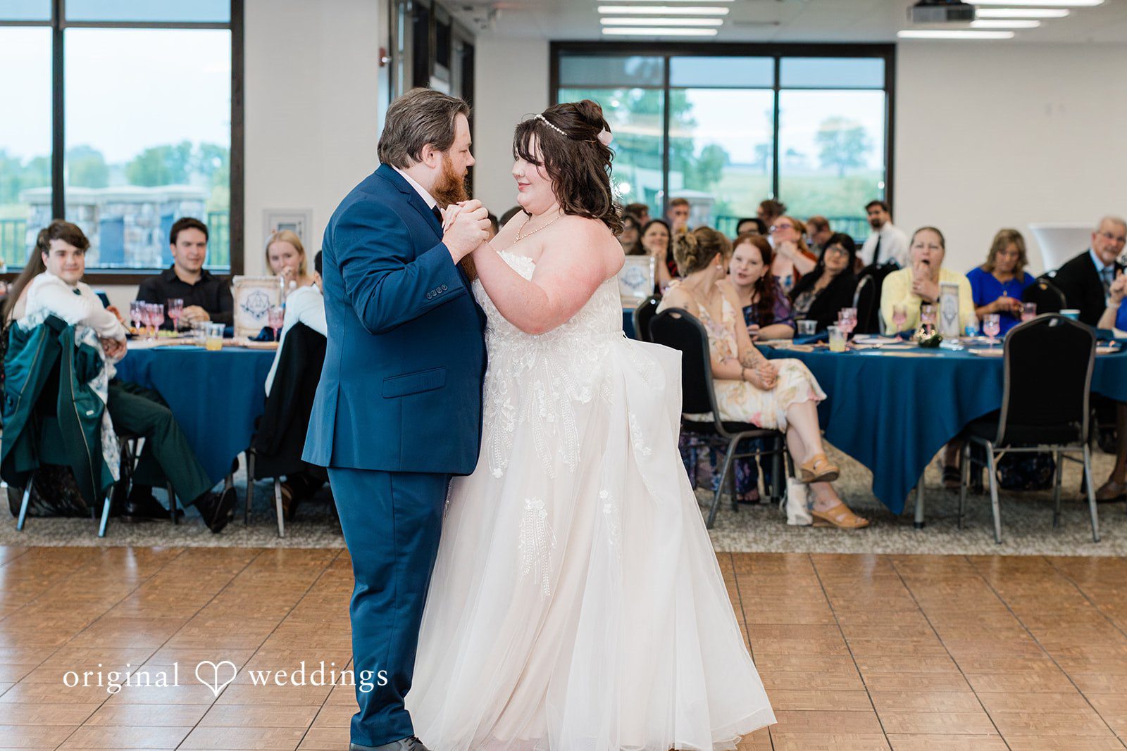 The couple takes their first dance