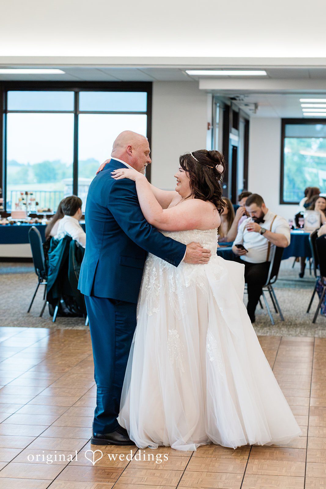 The bride dances with her father