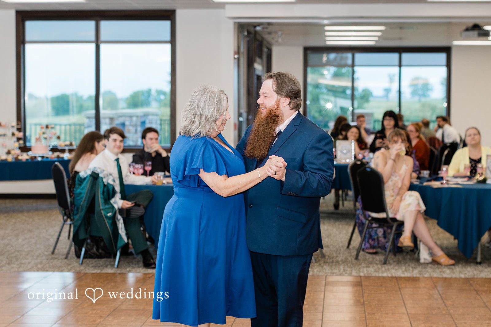 The groom dances with his mother