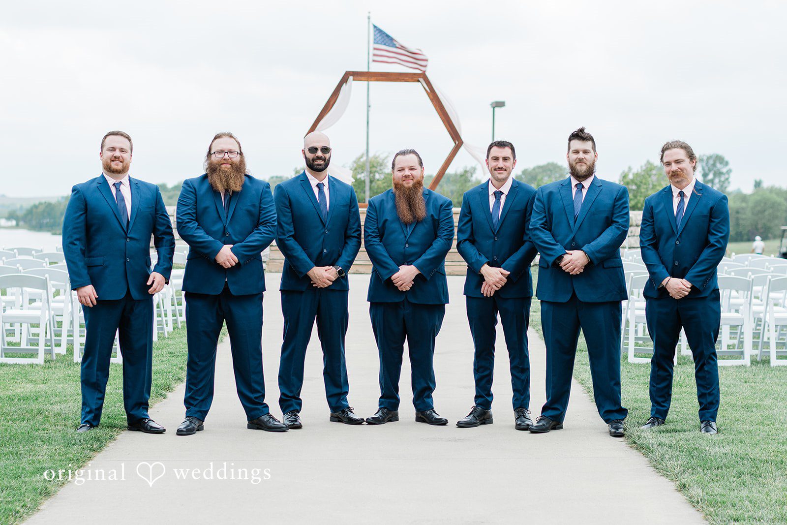 An outdoor portrait of the groom and his groomsmen