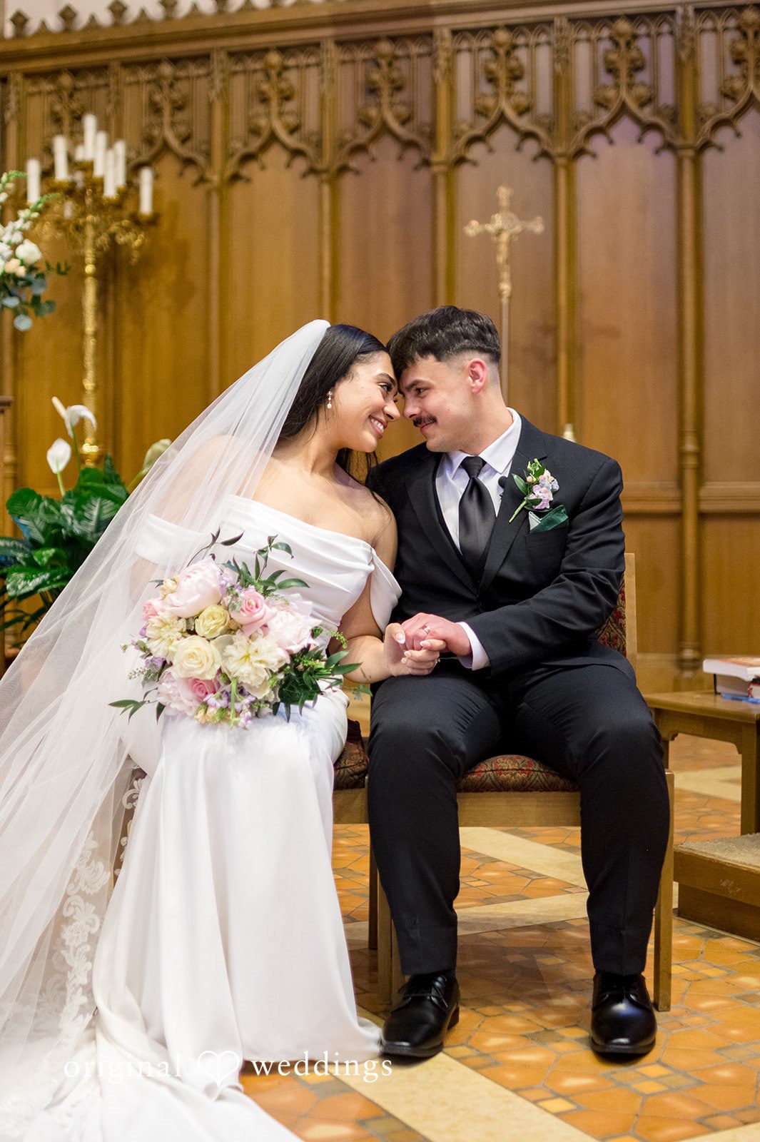 Kiarra + Anthony Romantic forehead touching couple portrait at Nativity of Our Lord Catholic Church