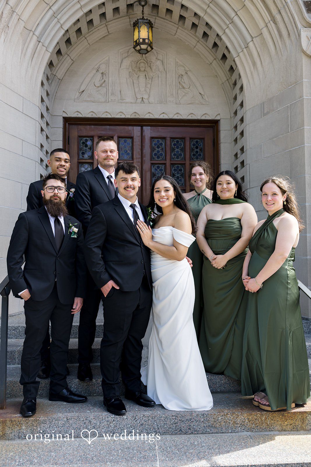 Kiarra + Anthony Romantic wedding group photo at Nativity of Our Lord Catholic Church