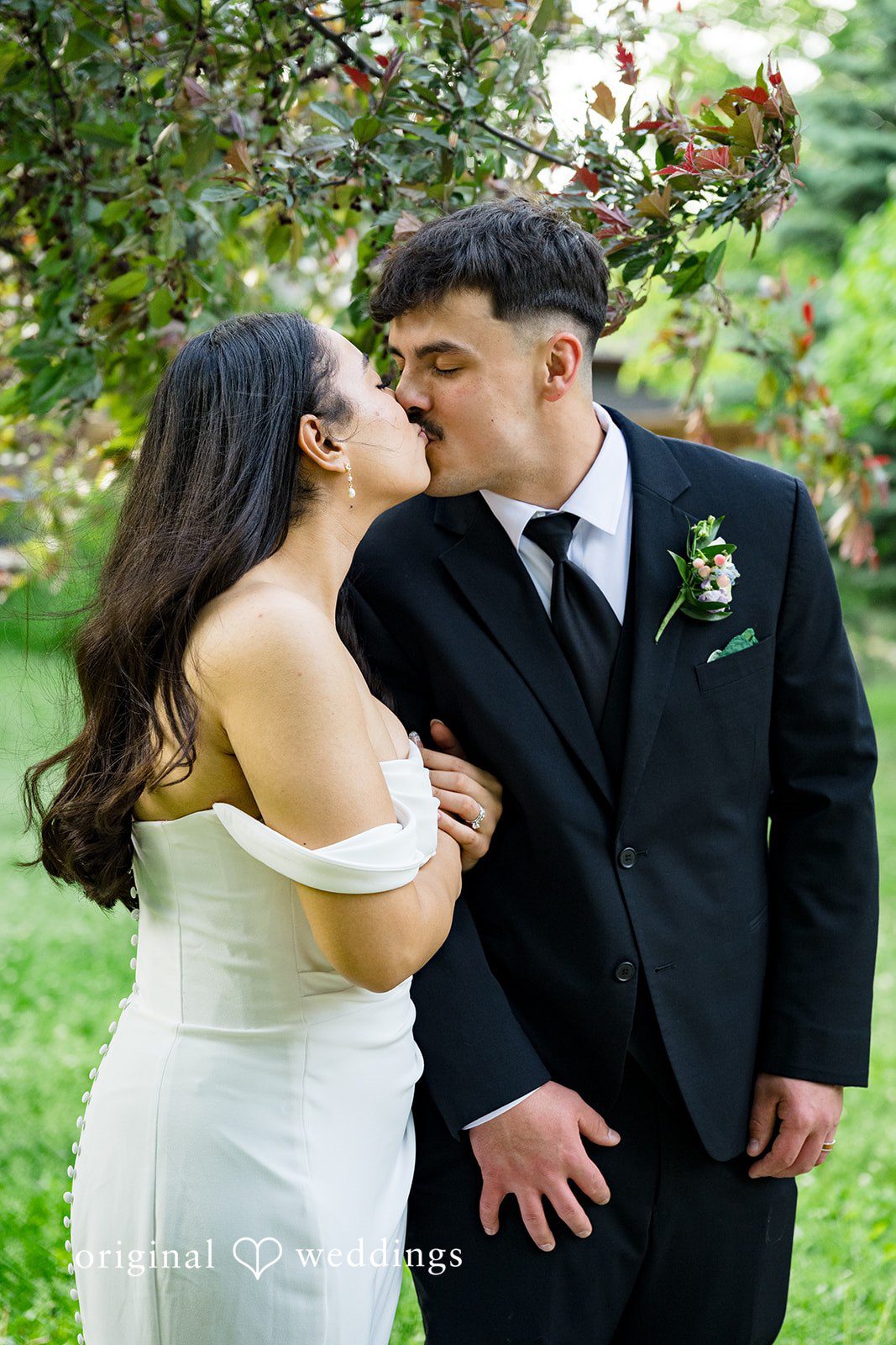 Kiarra + Anthony Beautiful emotional couple kiss shot at Nativity of Our Lord Catholic Church