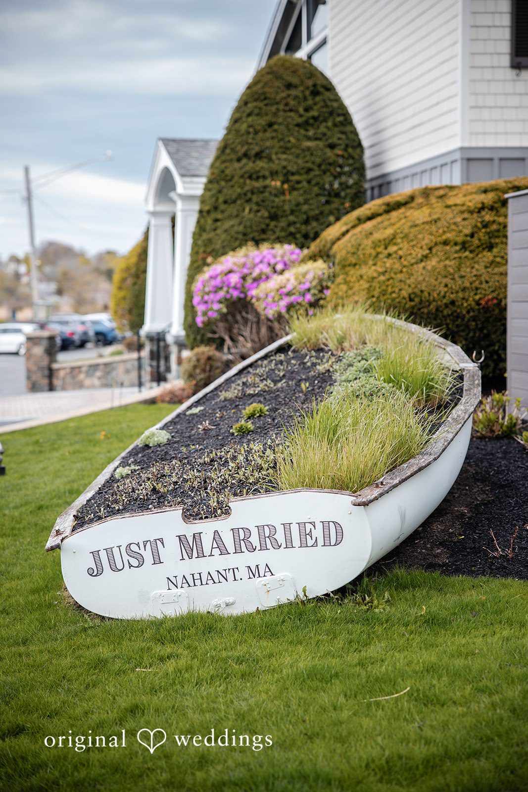 Exterior side view of Oceanview of Nahant with scenic ocean backdrop