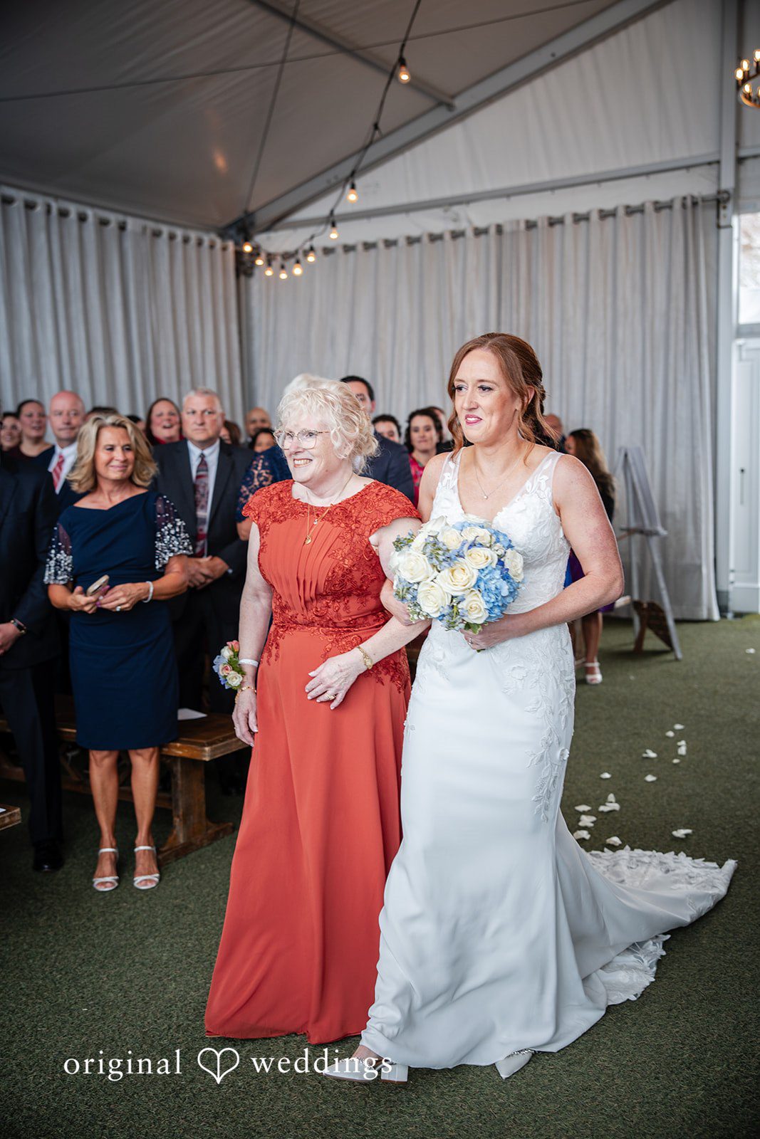 Bride entering the ceremony with her mother by her side