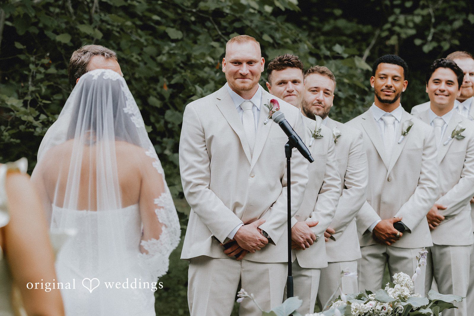 Groom looking towards the bride during wedding ceremony