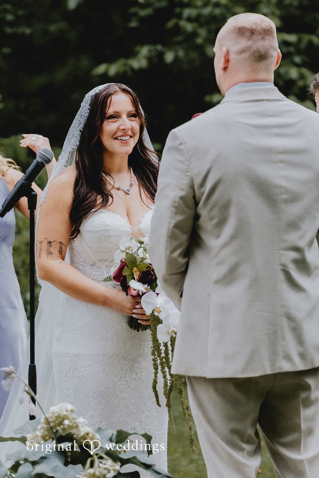 Bride looking at the groom with love and smile