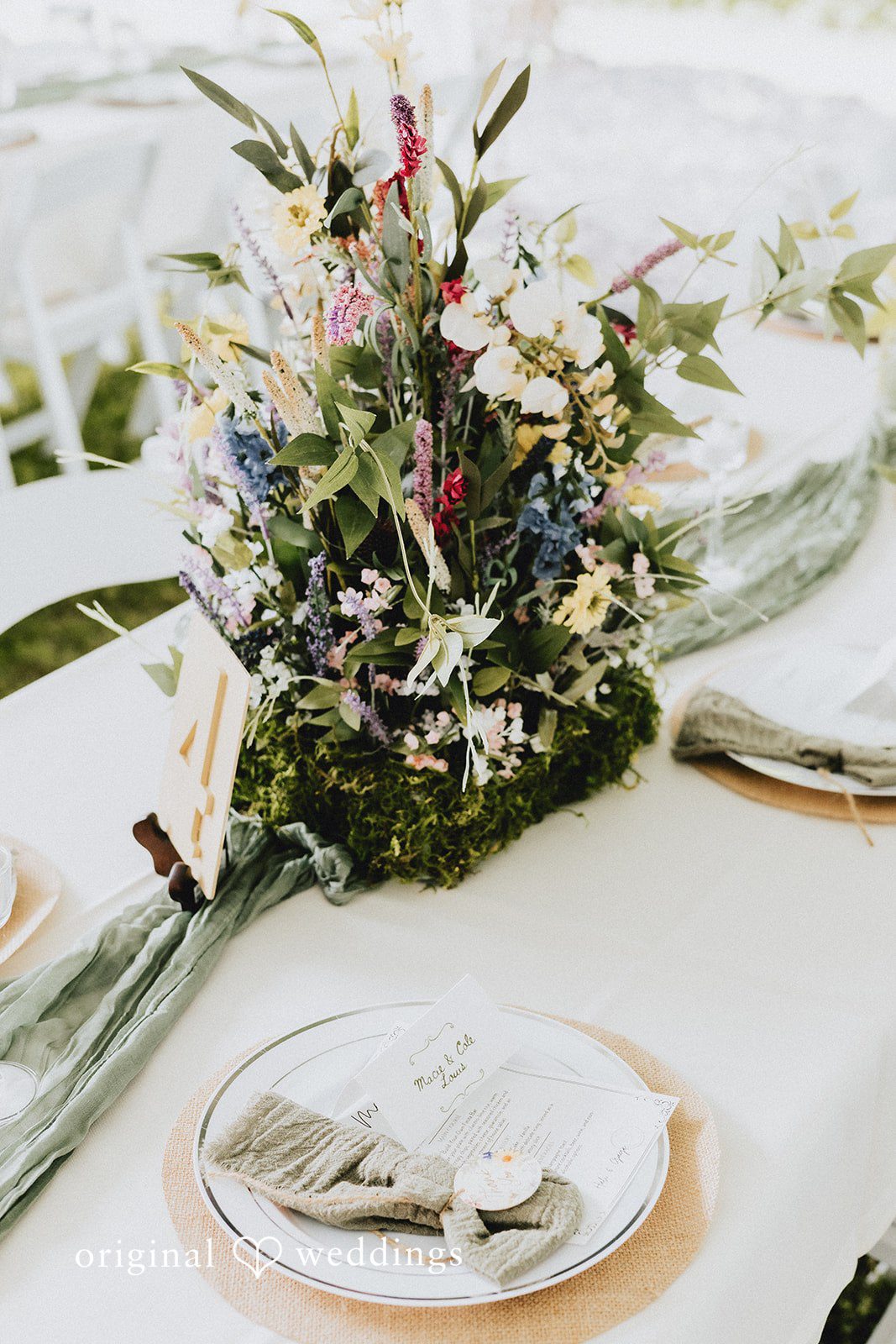 Wedding table decorated with flowers captured by Cincinnati Wedding Photographers