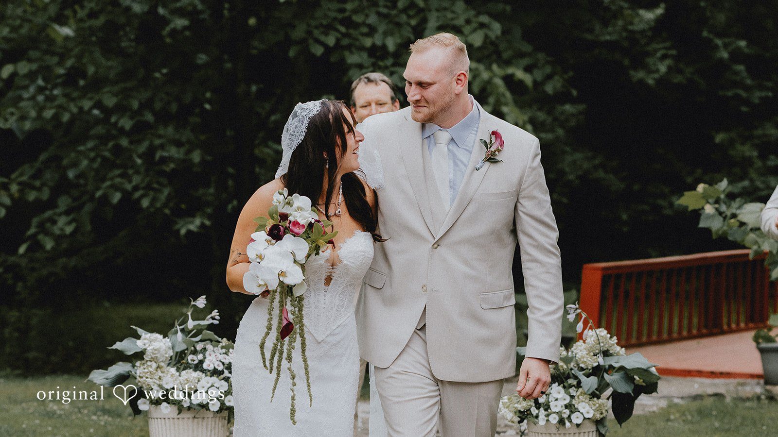 Bride and groom looking at each other with love