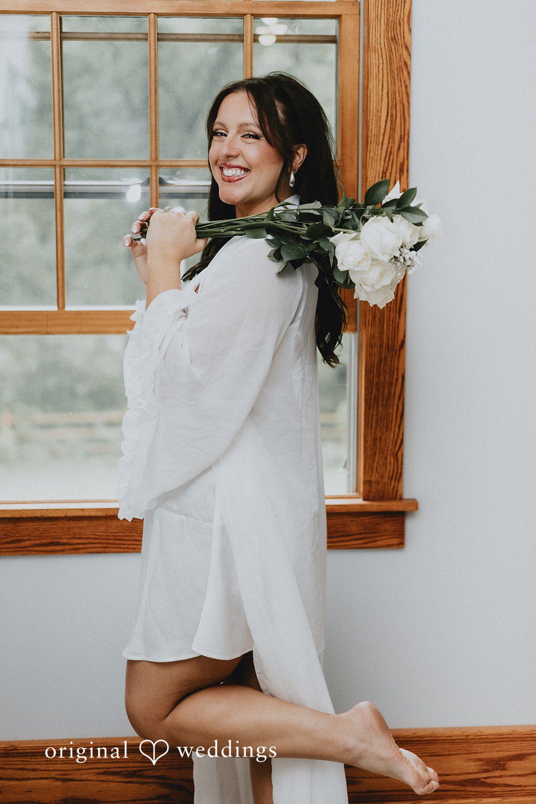Lovely portrait of bride while getting ready