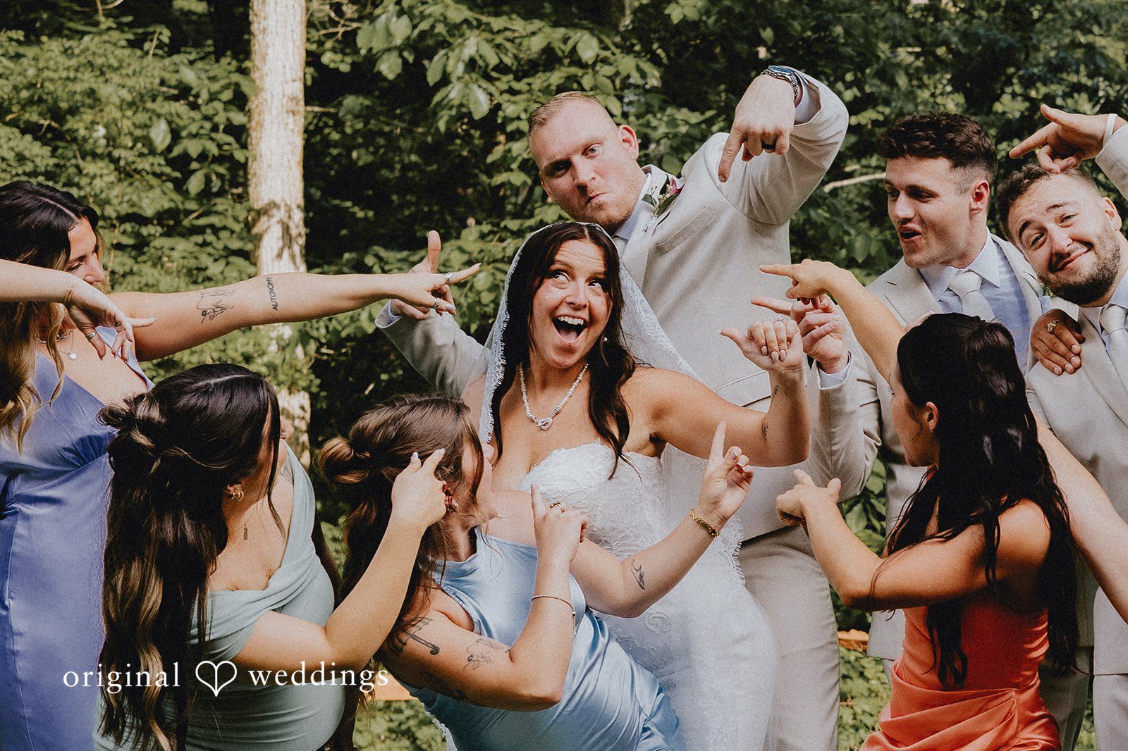 Lovely picture of couple with friends and family while celebrating