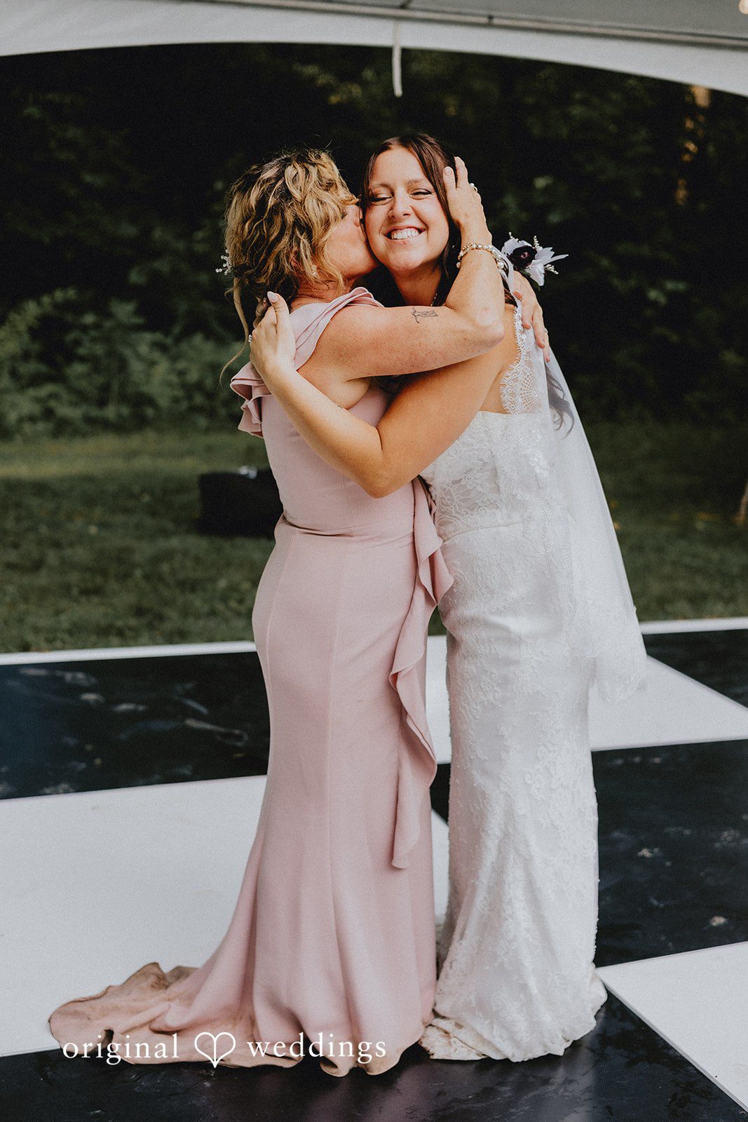 Bride sharing an emotional moment with someone