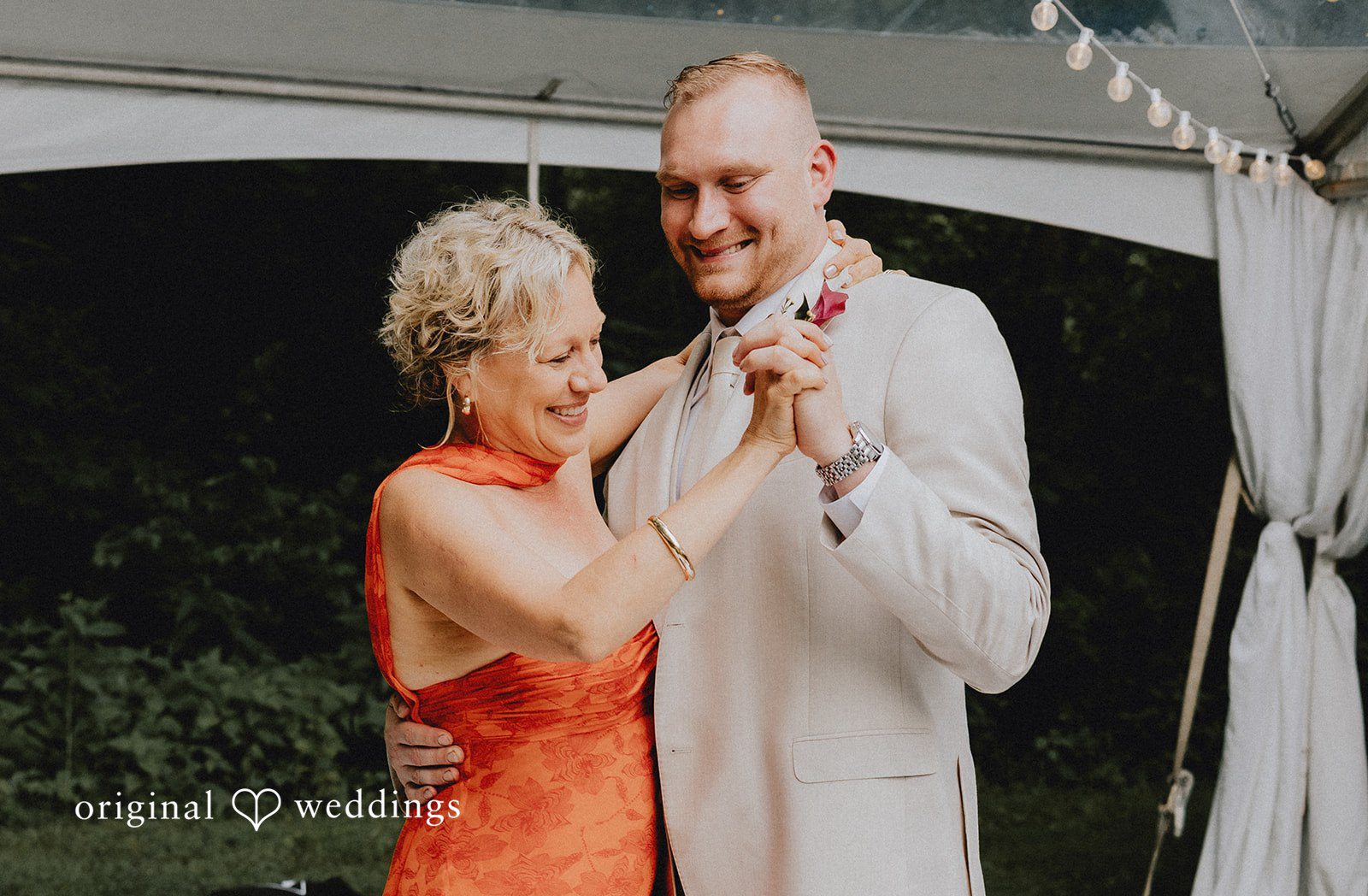 Groom sharing a dance with someone