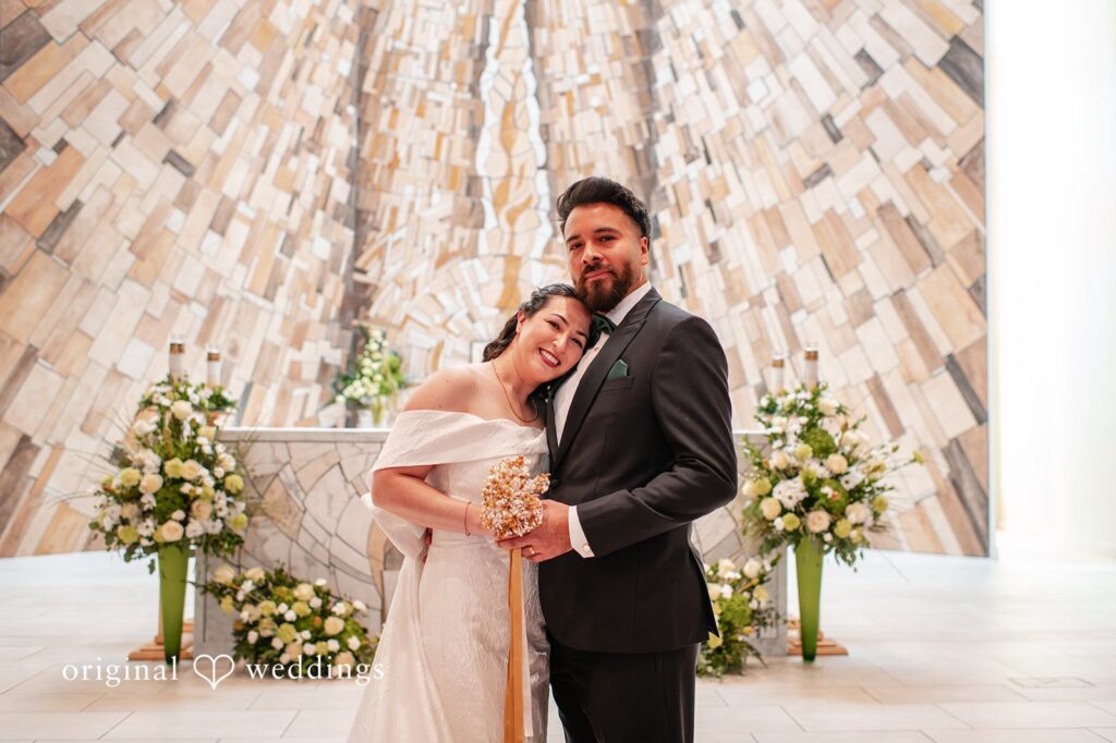 Paulina + Steve Bride resting her head on the groom’s chest during a portrait