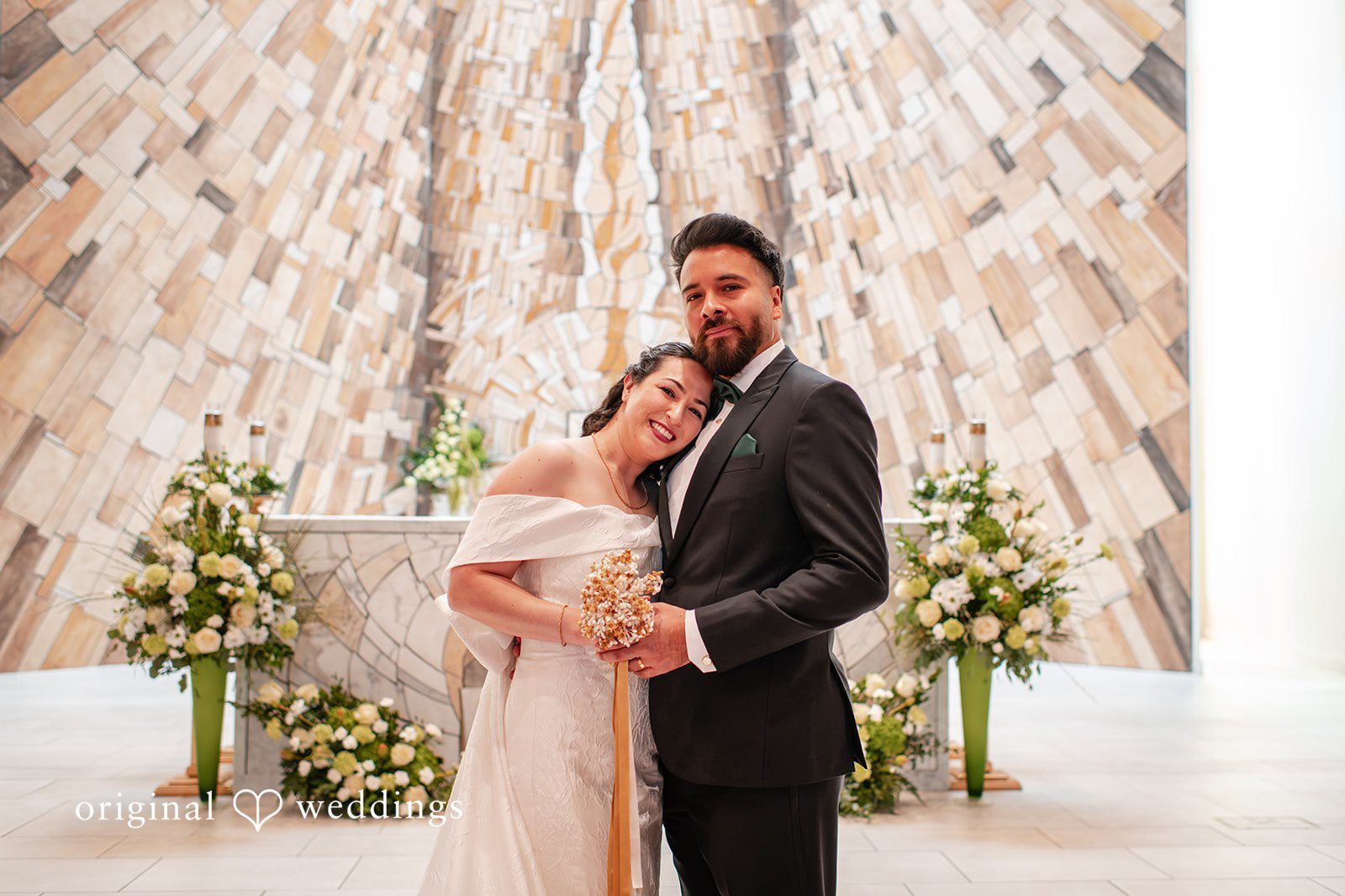 Original Weddings couple portrait captured by San Francisco Wedding Photographers at Our Lady of La Vang Parish during a romantic wedding