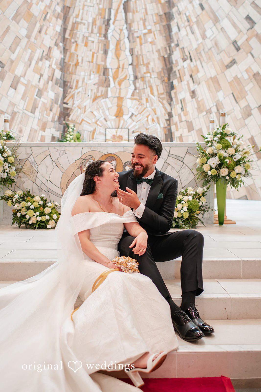 Paulina + Steve Bride and groom seated together during a romantic portrait session