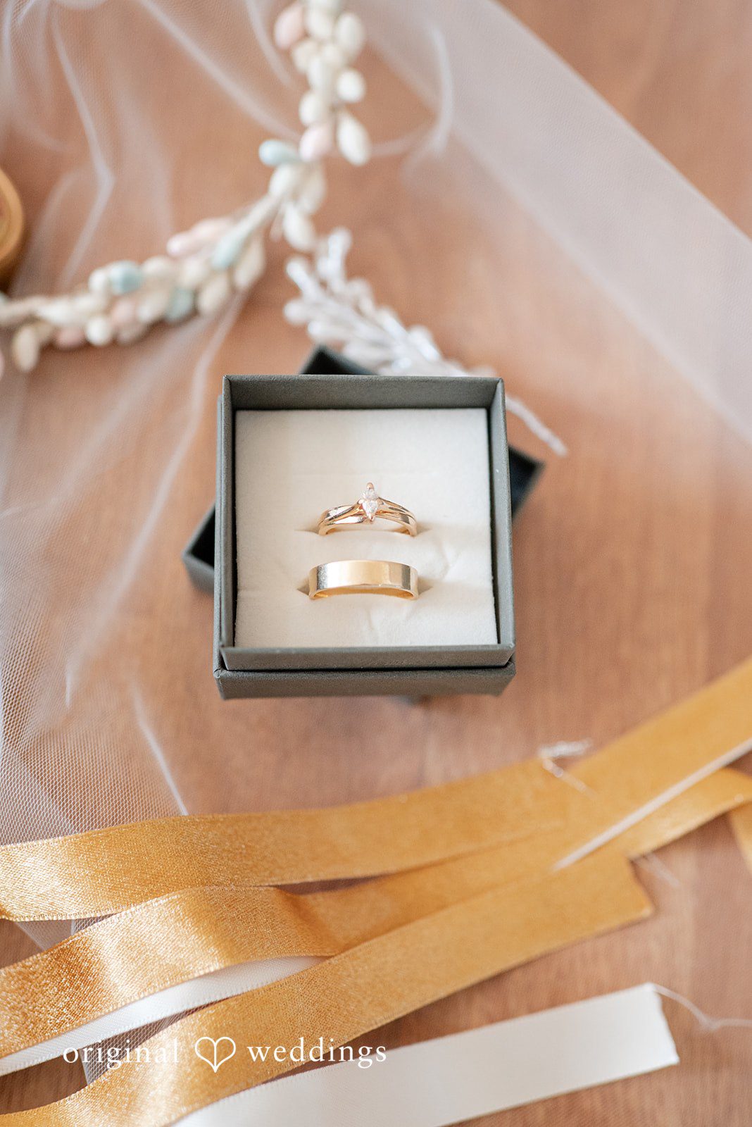 Paulina + Steve Close-up of the couple’s wedding rings before the ceremony
