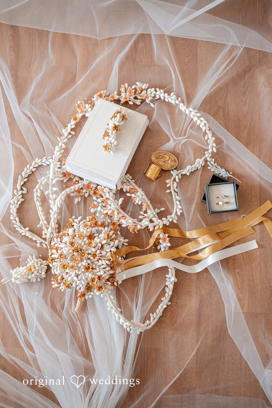 Paulina + Steve Wedding rings styled with elegant decorative details