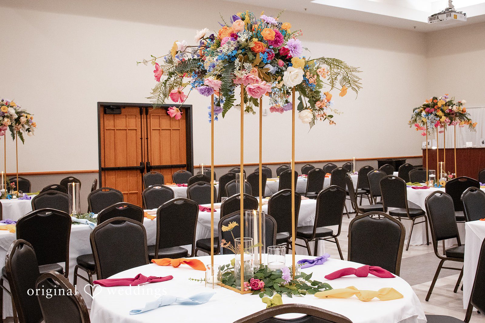 Brekyn + Benjie Beautifully decorated tables at the wedding reception