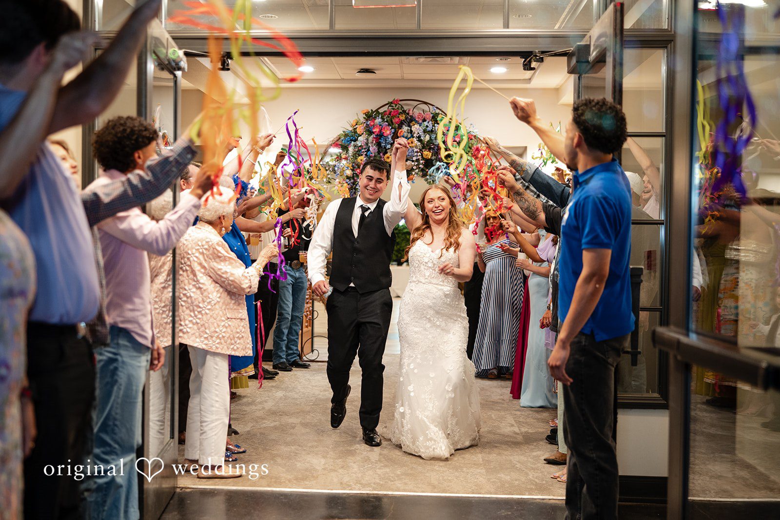 Brekyn + Benjie The couple makes a grand exit with cheers from guests