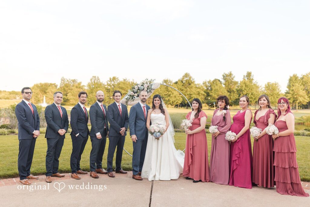 Our DC wedding photographers captured a stunning portrait of the couple and their bridal party at the Regency at Dominion Valley
