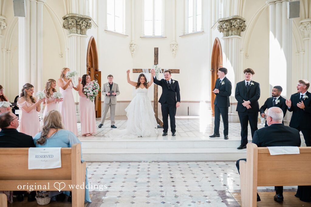 Newlyweds celebrating with guests following the ceremony