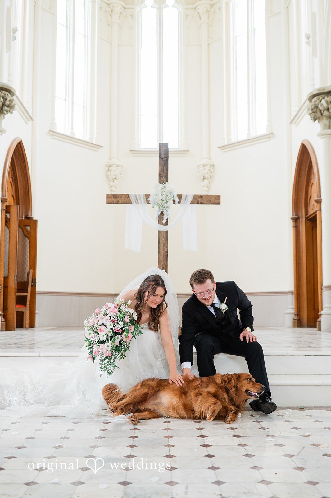 Newlyweds embracing during a joyful ceremony moment