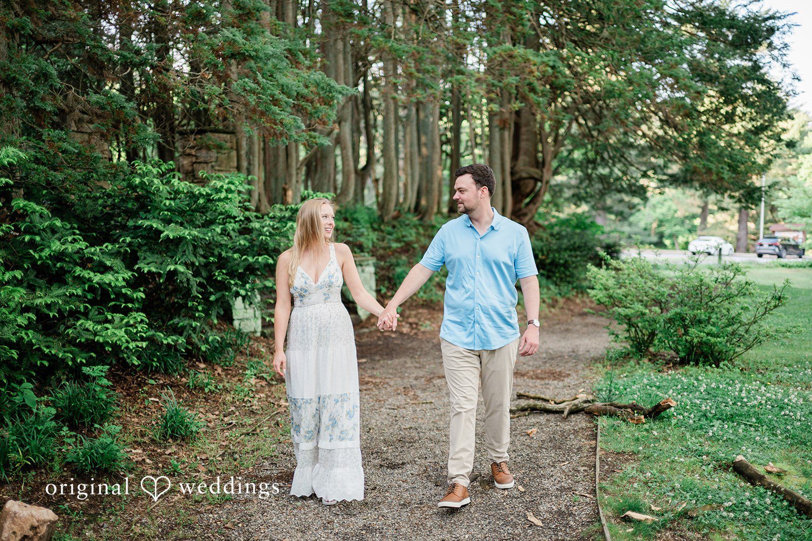 Our Philadelphia engagement photographers at Original Weddings captured the couple taking a walk at Ridley Creek State Park