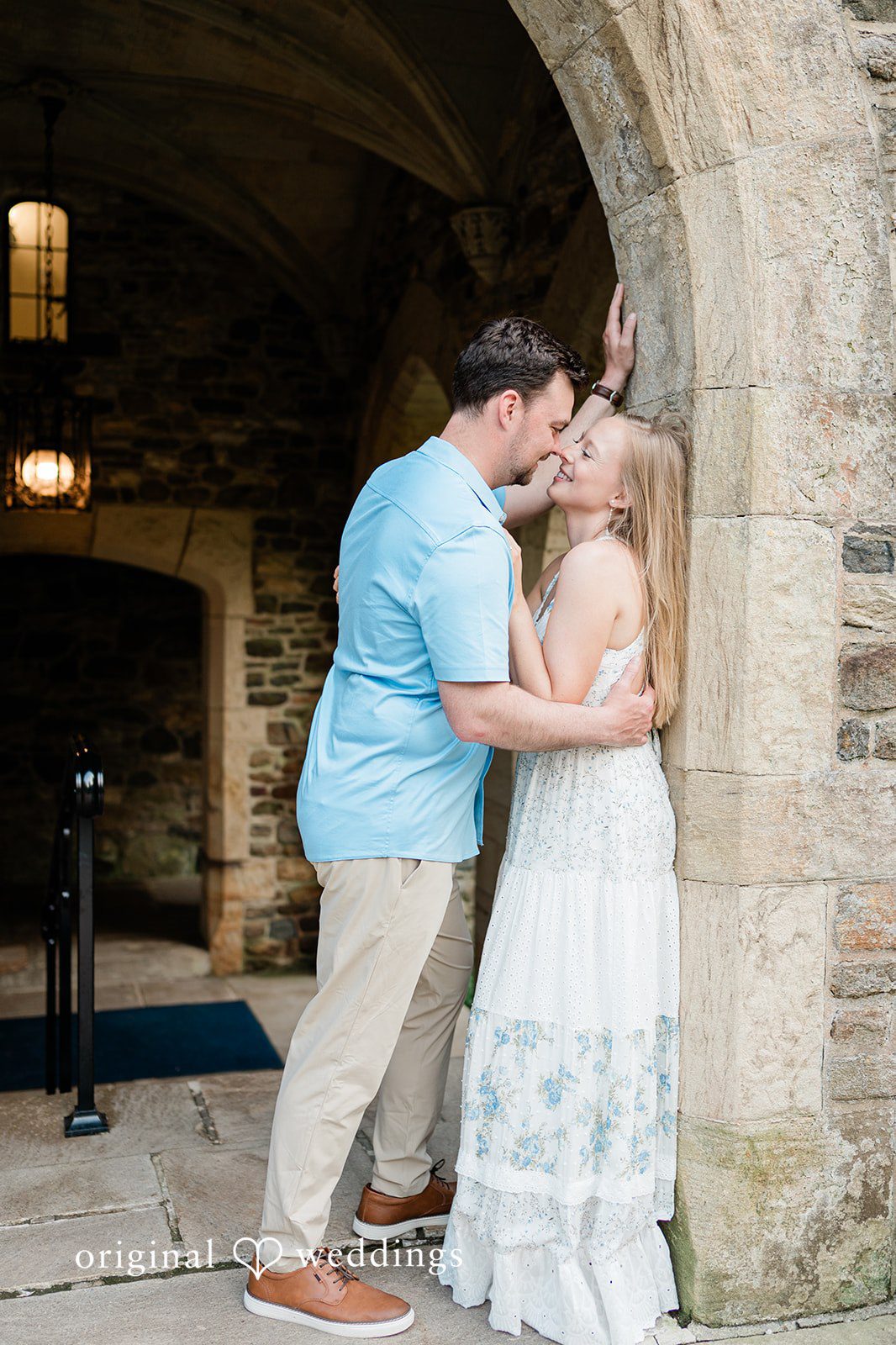 Justine + Danny A romantic portrait by the rocky building