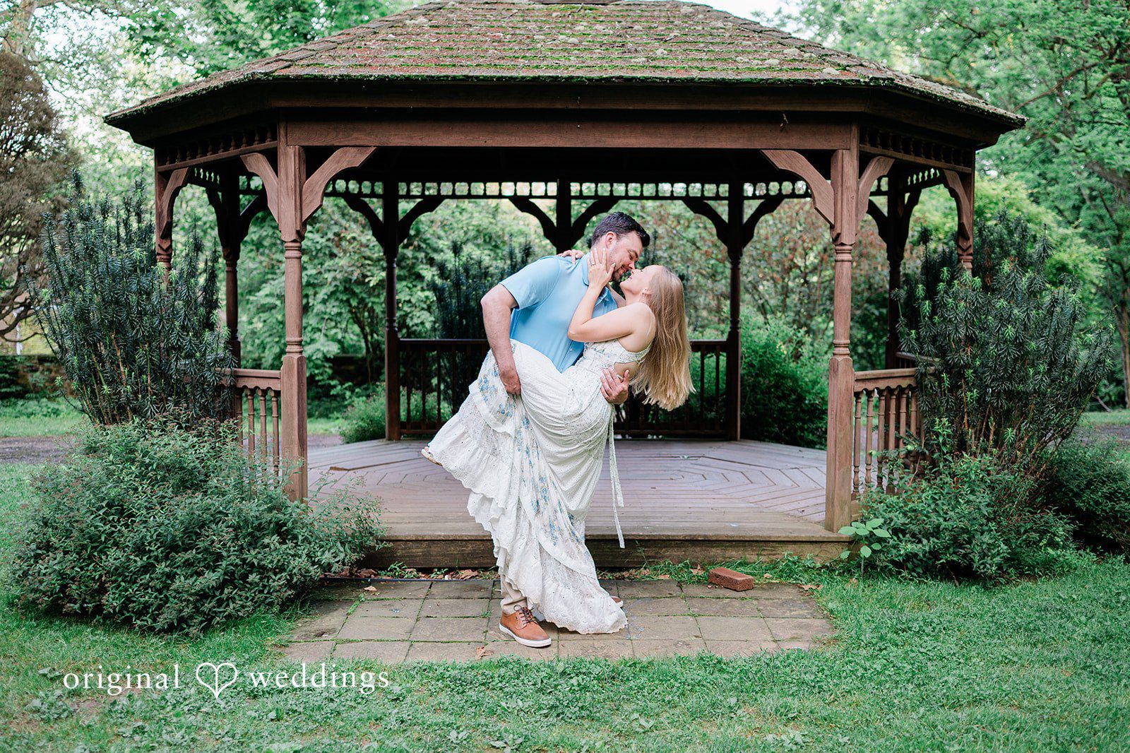 Justine + Danny Our Philadelphia engagement photographers captured a romantic portrait of the couple by the gazebo