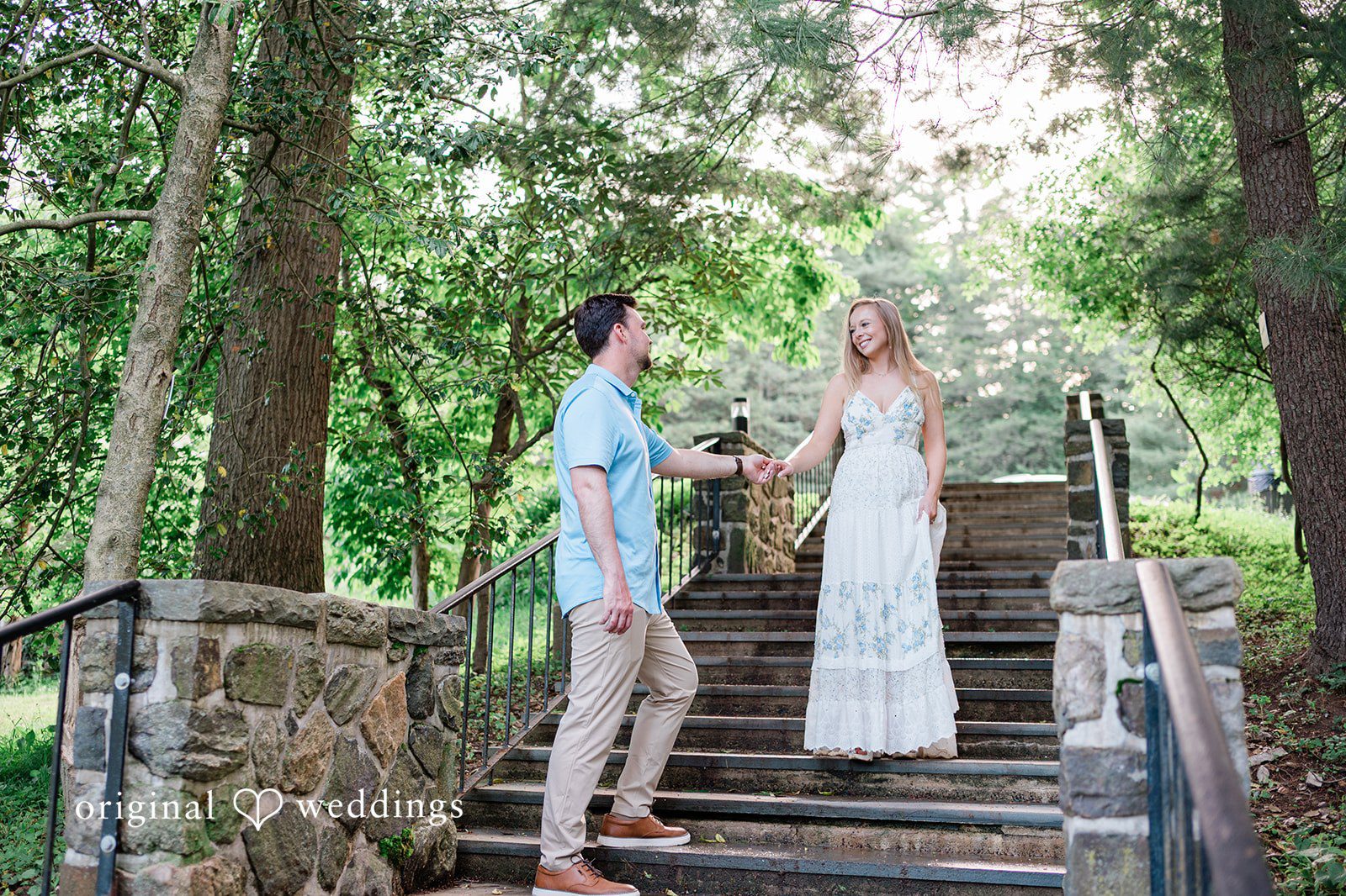 Justine + Danny The couple by the rocky stairs