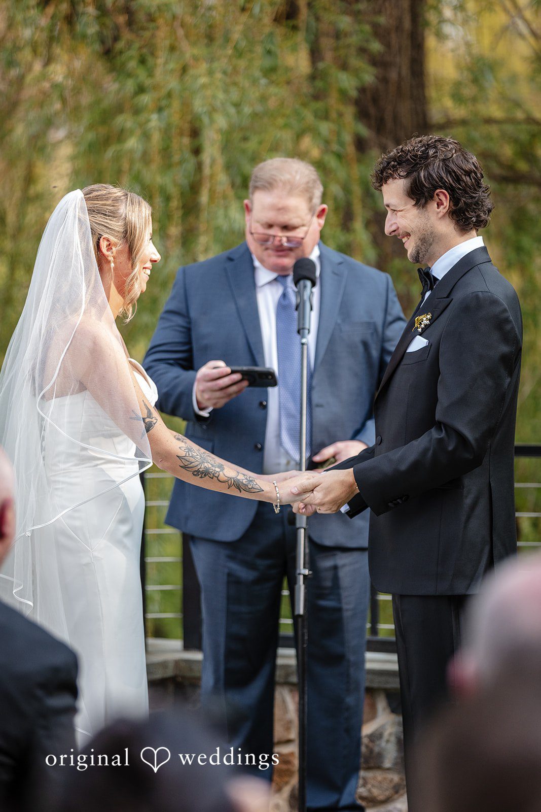 Couple sharing personal vows during the wedding ceremony