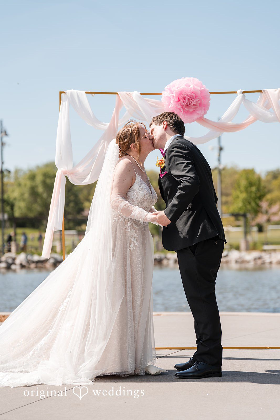 Katherine + Benjamin The couple takes their first kiss