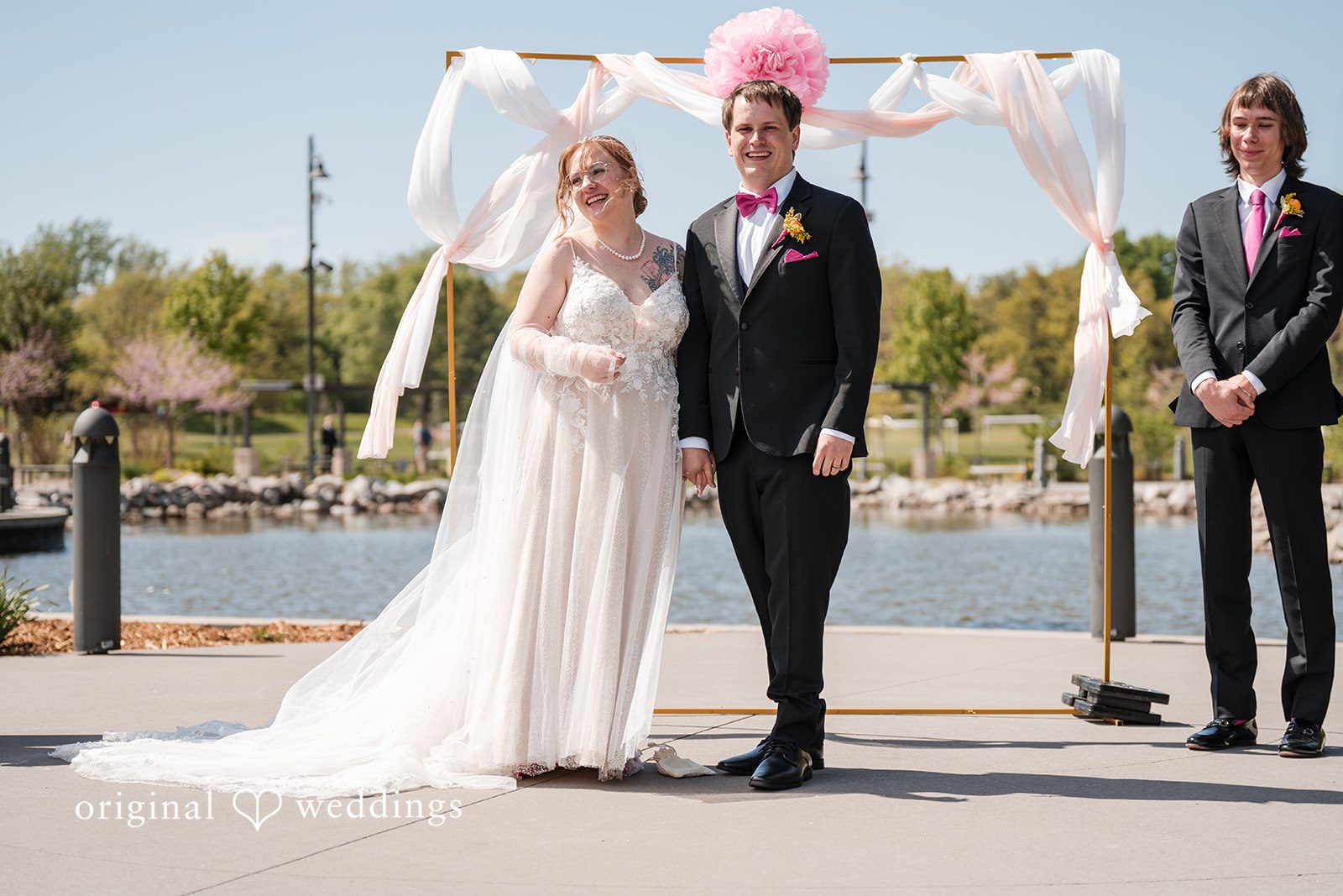 Katherine + Benjamin The couple shows great excitement after the exchange of marital vows
