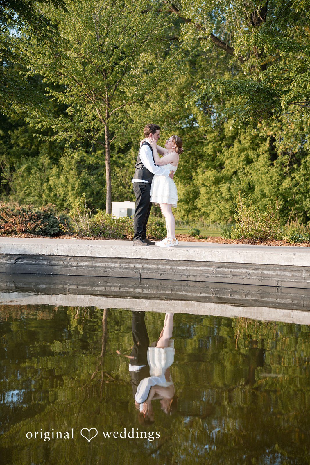 Katherine + Benjamin A portrait by the water and lush greenery