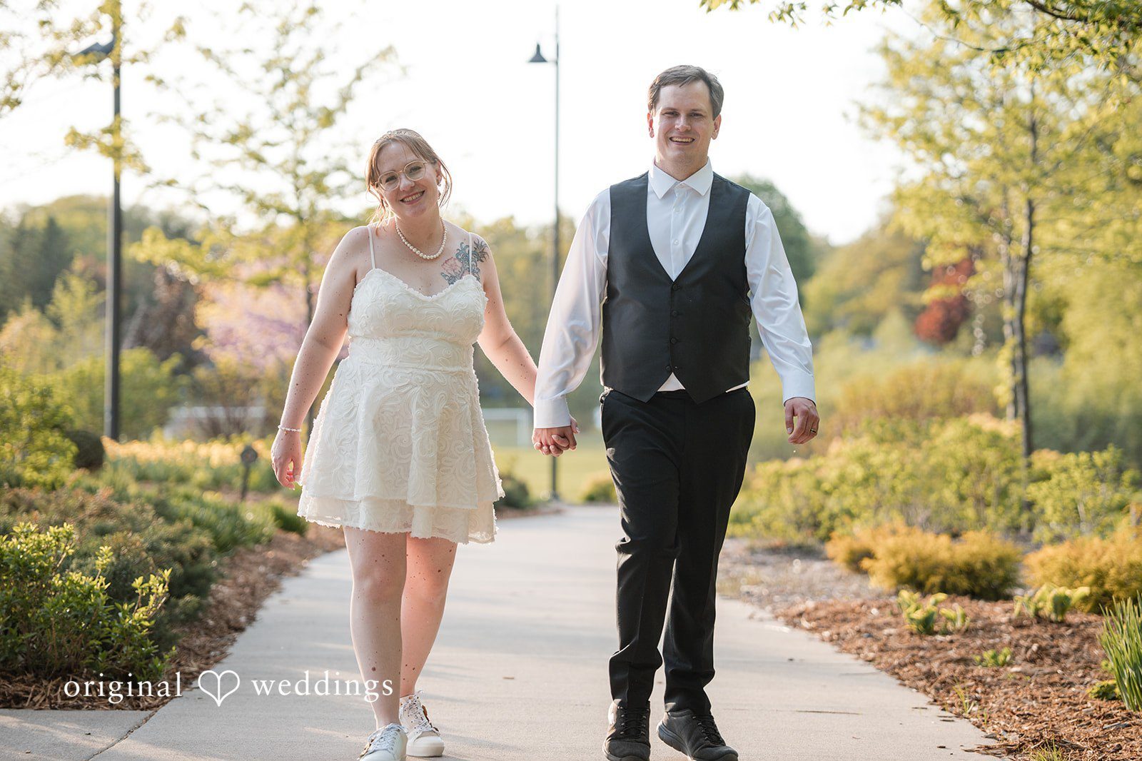 Our Minneapolis wedding photographers captured the moment the couple took a walk throughout the Shoreview Community Center