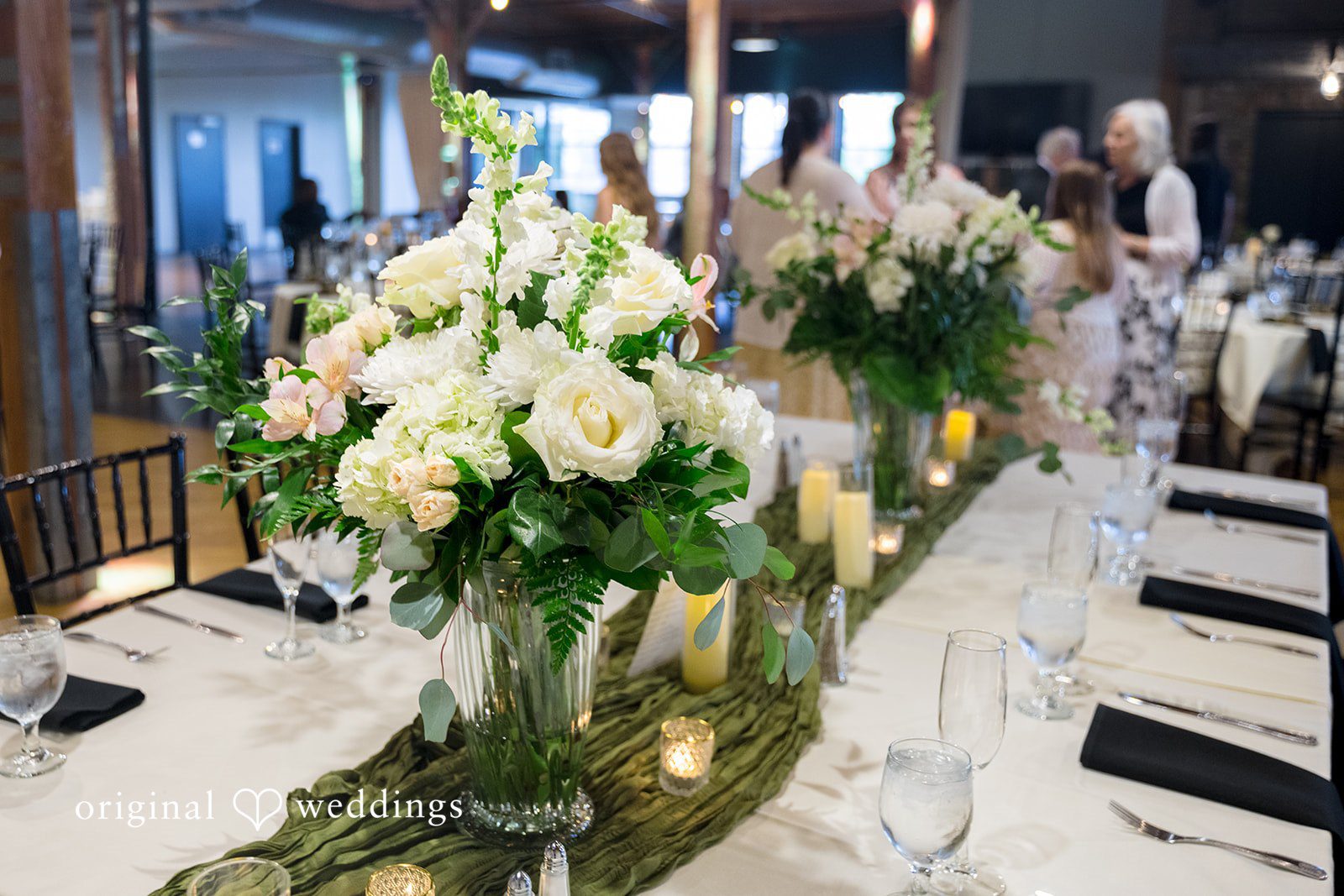 Kiarra + Anthony Elegant floral and candle centerpiece photography at Solar Arts