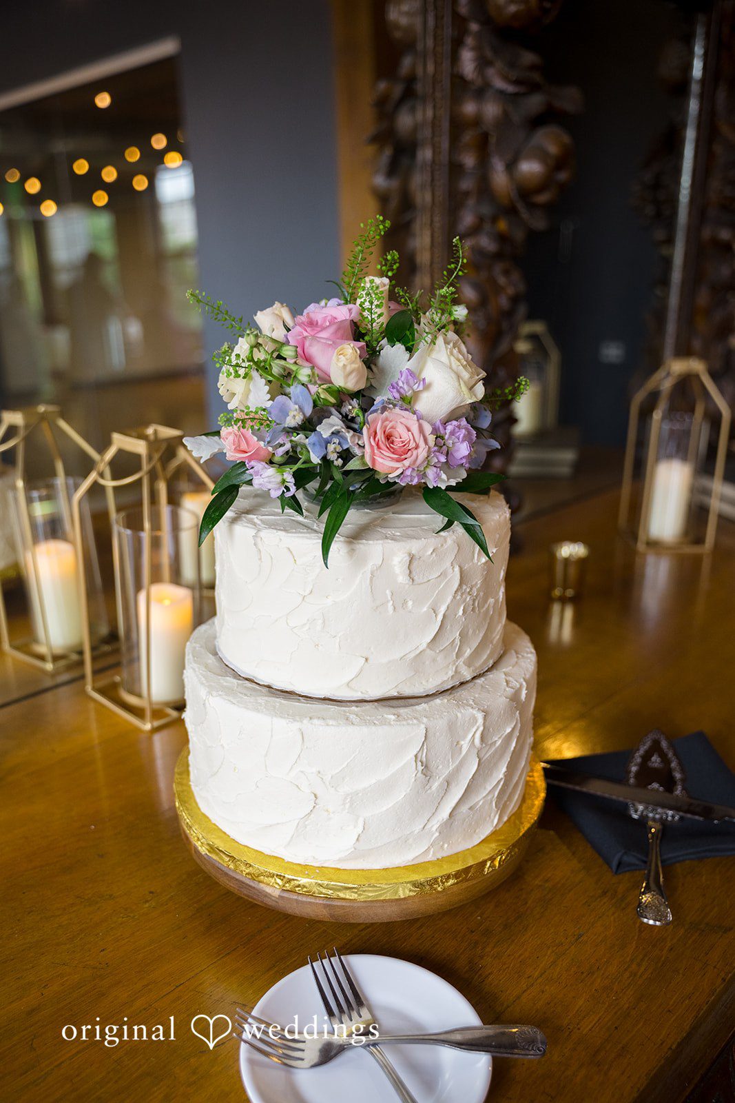Kiarra + Anthony Romantic reception cake display at Solar Arts